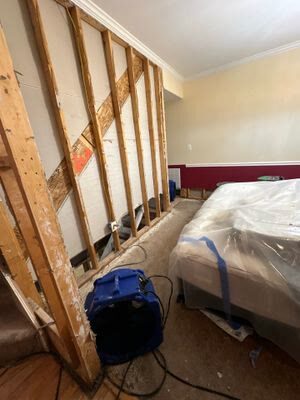 bedroom dried to framing with air mover, Manassas VA