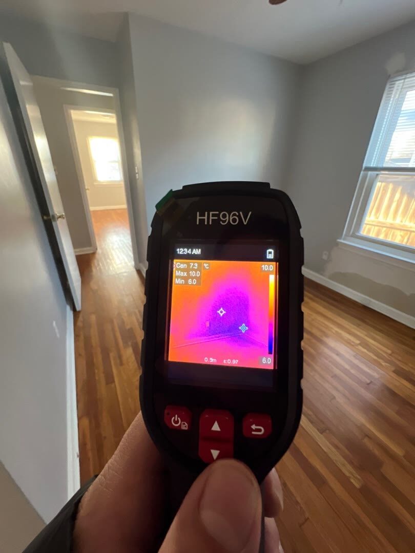 thermal imaging reveals hidden water behind a wall, Arlington VA