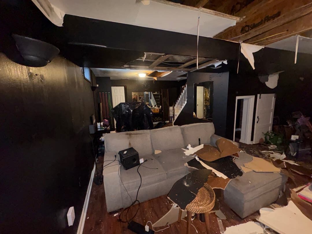 water damage spread across a finished basement rec room, Manassas VA