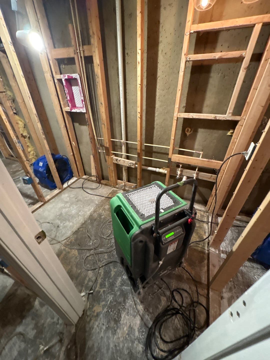 structural drying fleet running in a flood-cut basement, Manassas VA