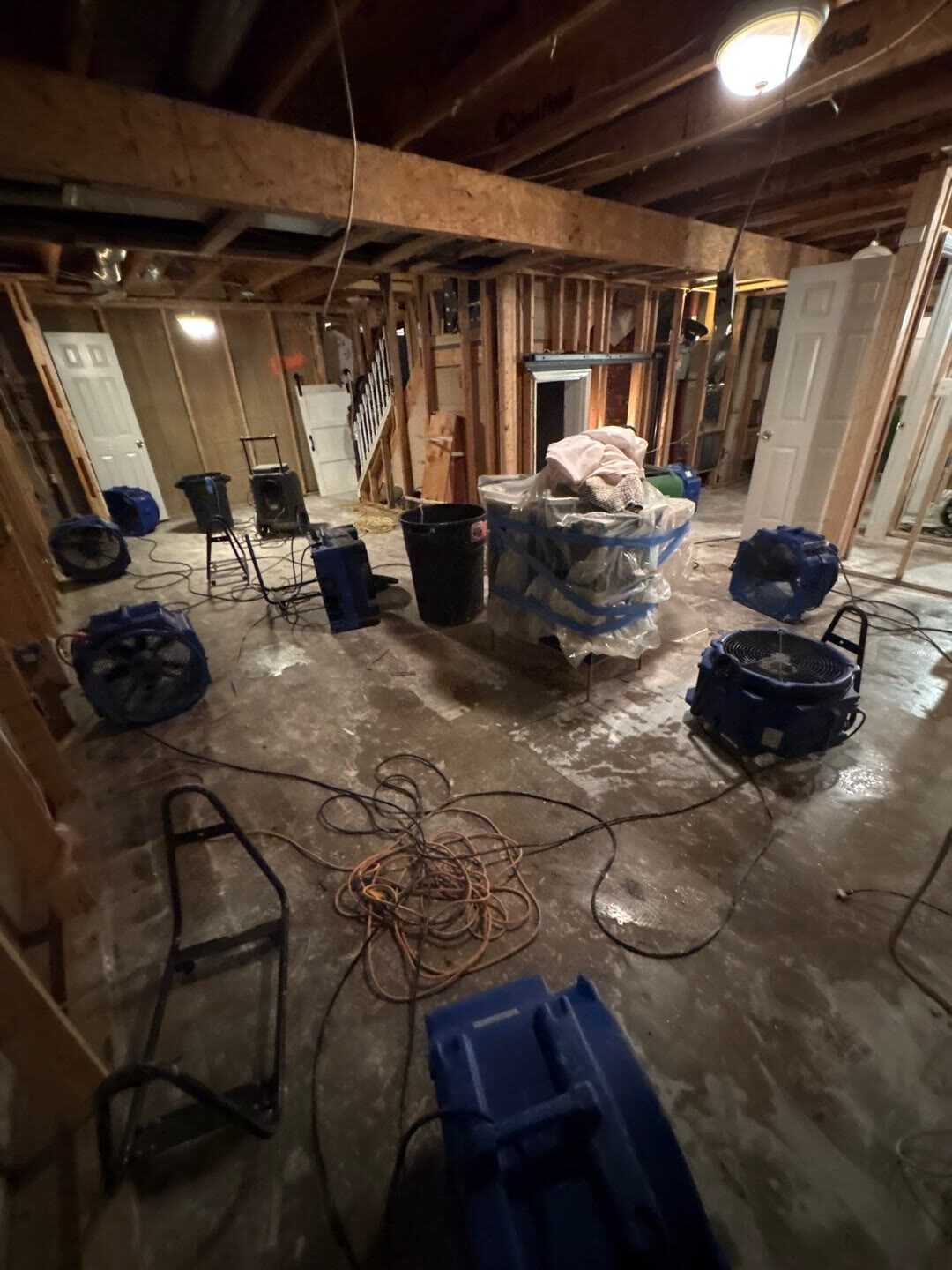 air movers drying the basement subfloor, Manassas VA
