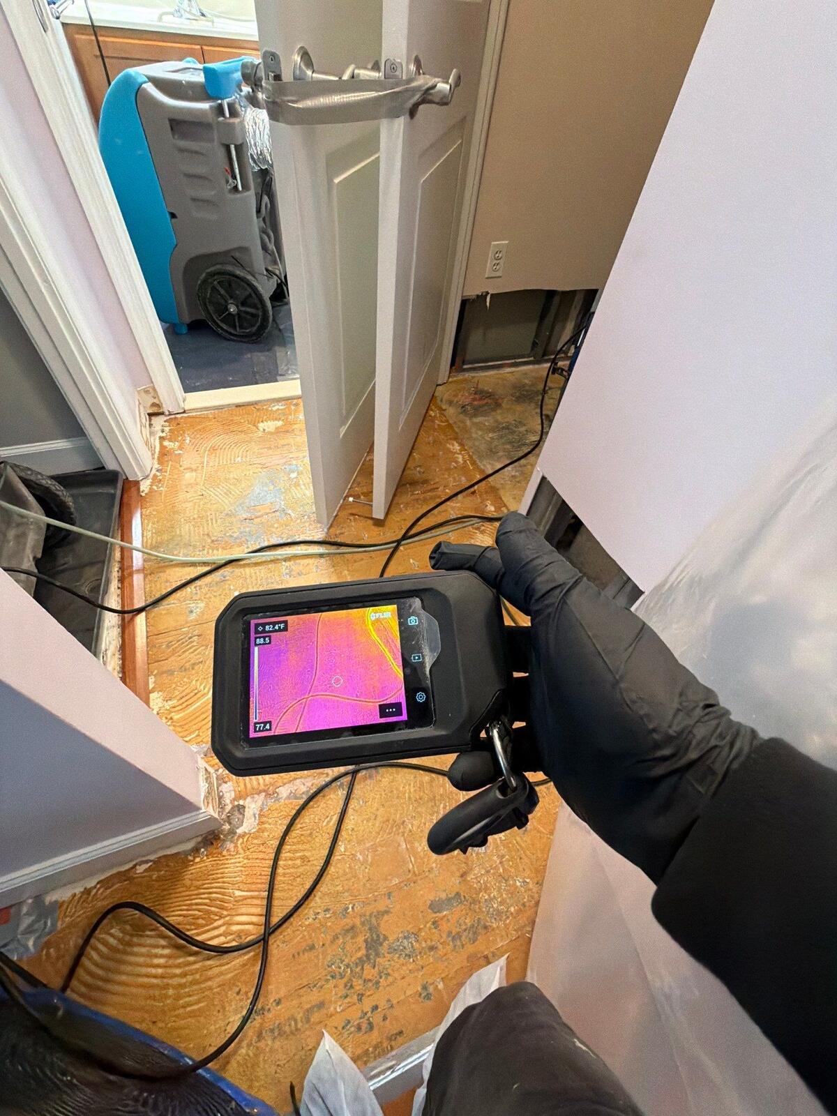 thermal scan over an opened subfloor with dehumidifier staged, Arlington VA